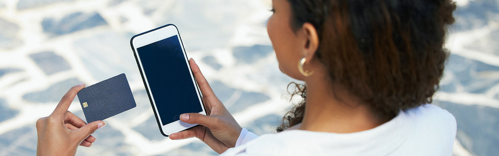 a woman holding a phone