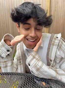 guy taking a photo with food