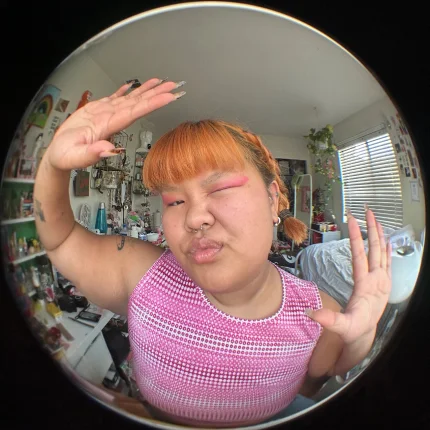 girl taking a photo with a tunnel filter